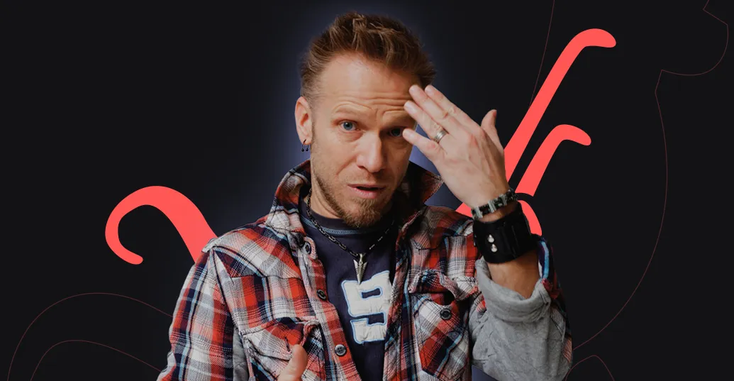 man posing with graphics behind him